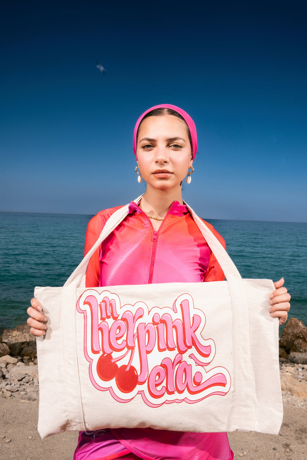 In her pink era bag